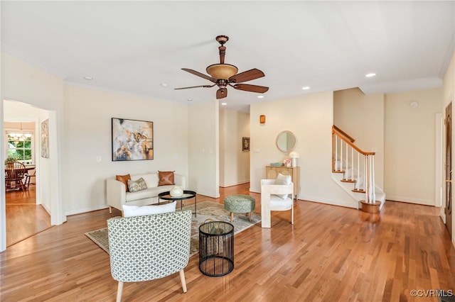 6125 Trinity Church Rd, Dinwiddie, VA 23833 - living area featuring stairs, light wood-style floors, ceiling fan, and recessed lighting