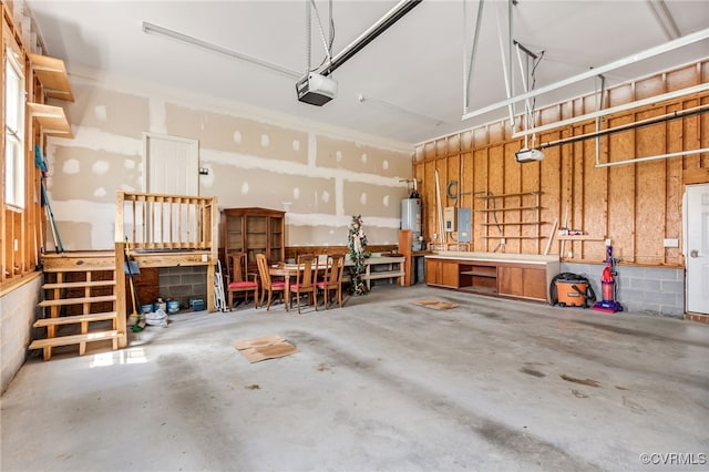 6125 Trinity Church Rd, Dinwiddie, VA 23833 - garage with a workshop area, a garage door opener, water heater, and electric panel