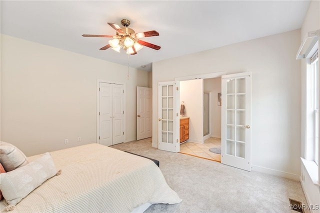 6125 Trinity Church Rd, Dinwiddie, VA 23833 - bedroom featuring french doors, light colored carpet, and a ceiling fan