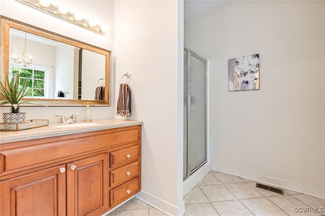 6125 Trinity Church Rd, Dinwiddie, VA 23833 - full bathroom featuring tile patterned floors, vanity, a shower stall, and a chandelier