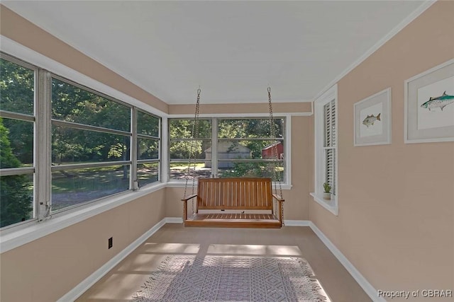 186 Bay Shore Point Rd, Port Haywood, VA 23138 - unfurnished sunroom featuring baseboards