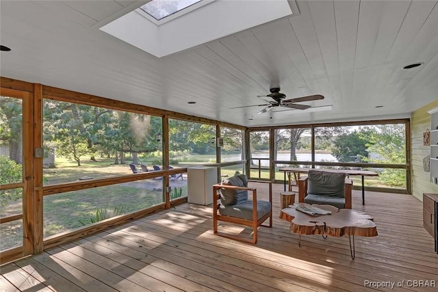 186 Bay Shore Point Rd, Port Haywood, VA 23138 - sunroom featuring a skylight, ceiling fan, and a water view