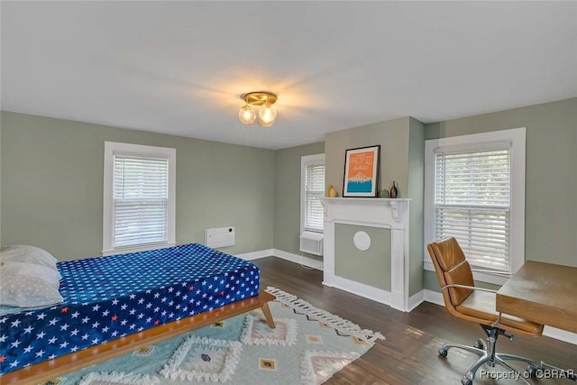 186 Bay Shore Point Rd, Port Haywood, VA 23138 - bedroom featuring multiple windows and wood finished floors
