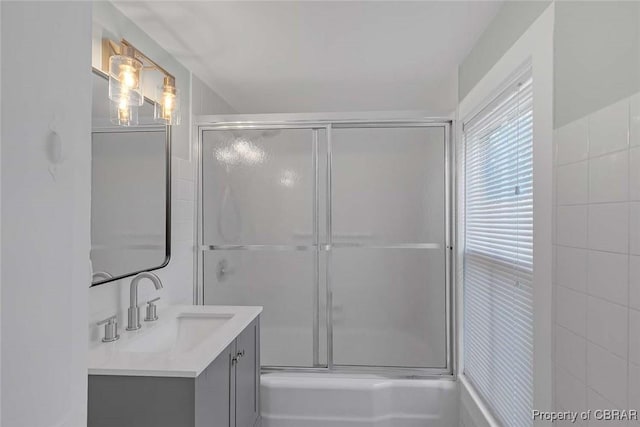 186 Bay Shore Point Rd, Port Haywood, VA 23138 - bathroom featuring vanity and combined bath / shower with glass door