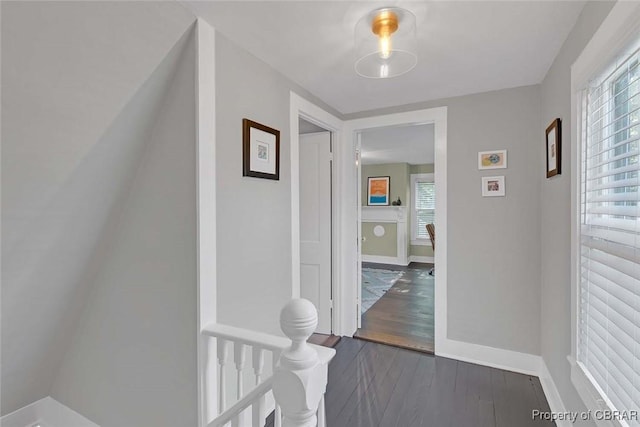 186 Bay Shore Point Rd, Port Haywood, VA 23138 - hallway with dark wood finished floors and baseboards