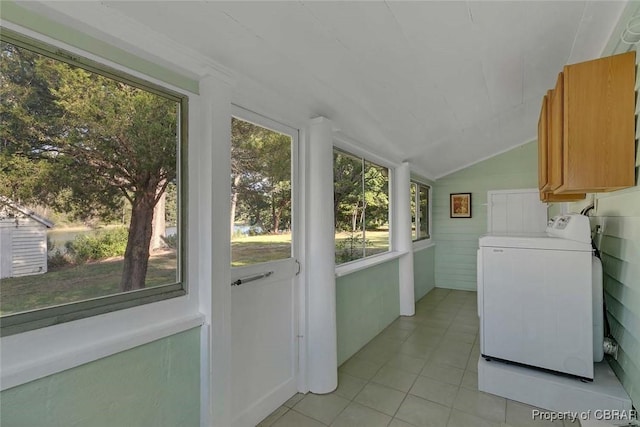 186 Bay Shore Point Rd, Port Haywood, VA 23138 - laundry room with washer / dryer and light tile patterned floors