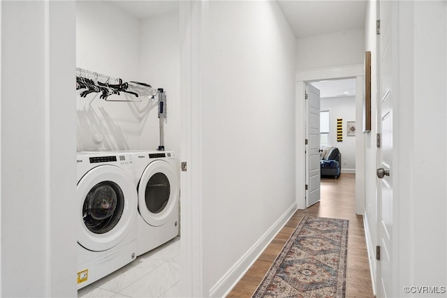 9524 Simonsville Rd, Midlothian, VA 23112 - washroom with washing machine and dryer and wood finished floors