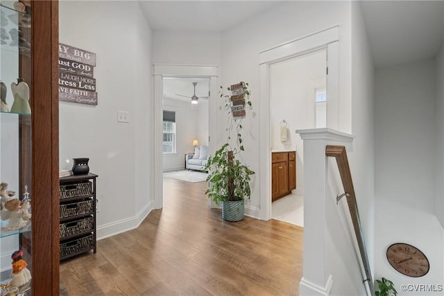 9524 Simonsville Rd, Midlothian, VA 23112 - hallway featuring light wood-type flooring and baseboards