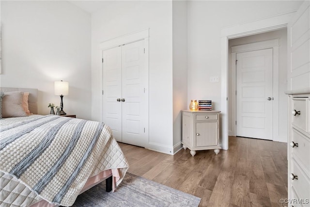 9524 Simonsville Rd, Midlothian, VA 23112 - bedroom featuring wood finished floors and a closet