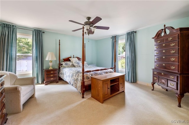 4310 Courthouse Rd, Prince George, VA 23875 - bedroom with multiple windows, light carpet, and a ceiling fan