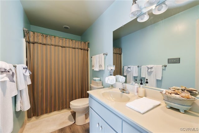 4310 Courthouse Rd, Prince George, VA 23875 - bathroom featuring vanity, wood finished floors, and curtained shower