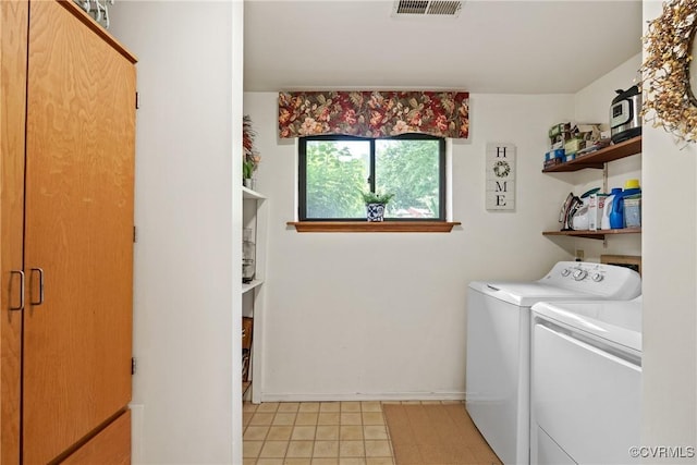 275 Meadowview Ln, Farmville, VA 23901 - washroom with washing machine and clothes dryer and light tile patterned floors