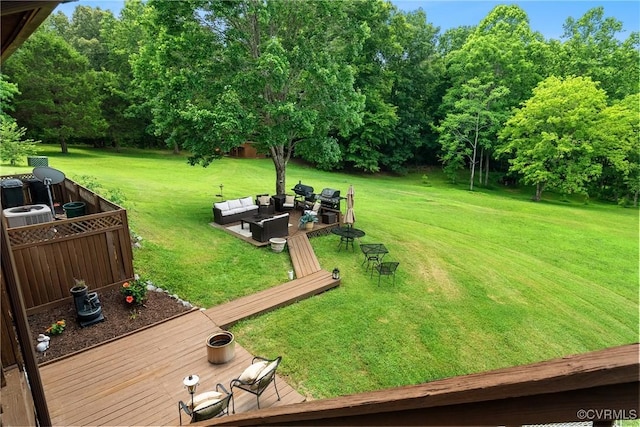 275 Meadowview Ln, Farmville, VA 23901 - view of grassy yard with outdoor lounge area, a deck, and view of wooded area