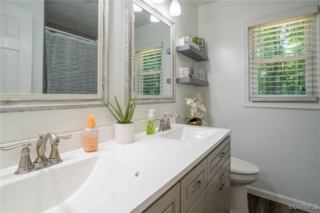 12001 Buckhorn Rd, Chesterfield, VA 23838 - full bath featuring double vanity and wood finished floors