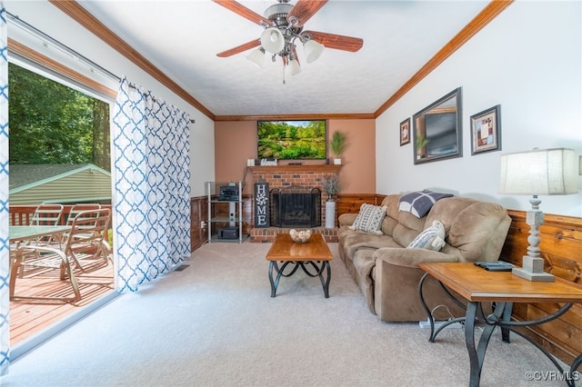 12001 Buckhorn Rd, Chesterfield, VA 23838 - living room featuring carpet, crown molding, a ceiling fan, a brick fireplace, and a wainscoted wall