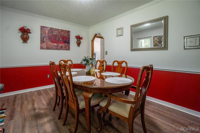 12001 Buckhorn Rd, Chesterfield, VA 23838 - dining space featuring wood finished floors, arched walkways, crown molding, and a textured ceiling