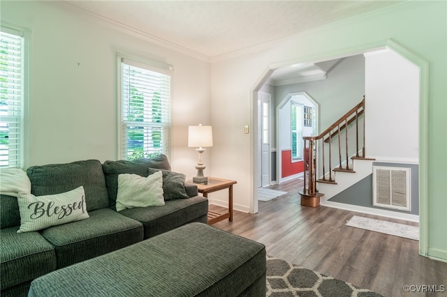 12001 Buckhorn Rd, Chesterfield, VA 23838 - living area with dark wood-style floors, arched walkways, ornamental molding, and stairs