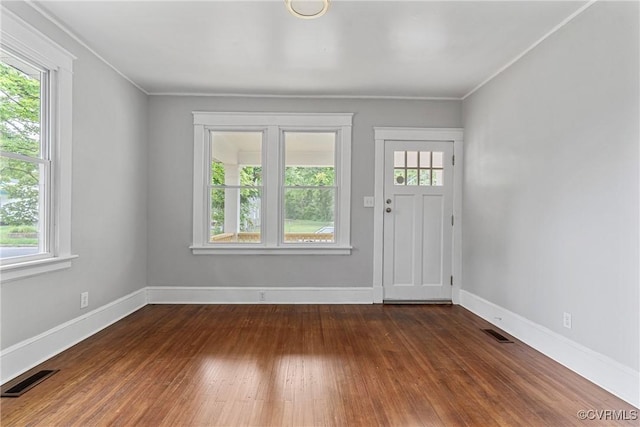 3406 Lawson St, Richmond, VA 23224 - foyer featuring dark wood-style floors and ornamental molding