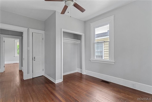 3406 Lawson St, Richmond, VA 23224 - unfurnished bedroom with dark wood finished floors, a closet, and a ceiling fan