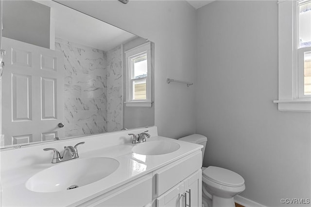 3406 Lawson St, Richmond, VA 23224 - bathroom featuring toilet and double vanity