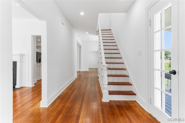 521 S Sycamore St, Petersburg, VA 23803 - stairs with healthy amount of natural light, hardwood / wood-style flooring, and recessed lighting