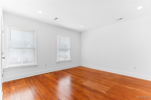 521 S Sycamore St, Petersburg, VA 23803 - unfurnished room featuring hardwood / wood-style floors and recessed lighting
