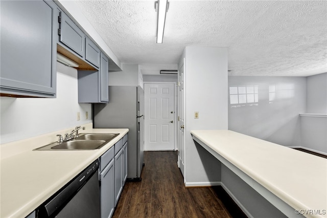 7604 Roscommon Ct Unit 2403, Henrico, VA 23228 - kitchen with stainless steel appliances, dark wood-style flooring, light countertops, a textured ceiling, and gray cabinetry