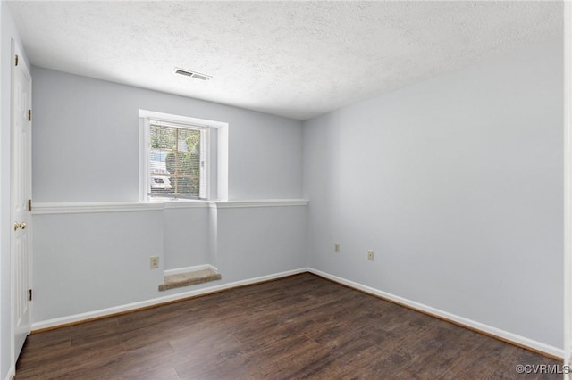 7604 Roscommon Ct Unit 2403, Henrico, VA 23228 - unfurnished room featuring wood finished floors and a textured ceiling