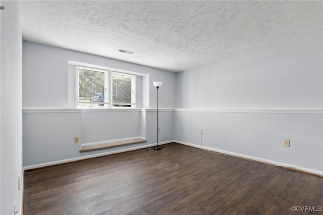 7604 Roscommon Ct Unit 2403, Henrico, VA 23228 - spare room with wood finished floors and a textured ceiling