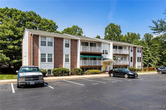 7604 Roscommon Ct Unit 2403, Henrico, VA 23228 - view of building exterior featuring uncovered parking