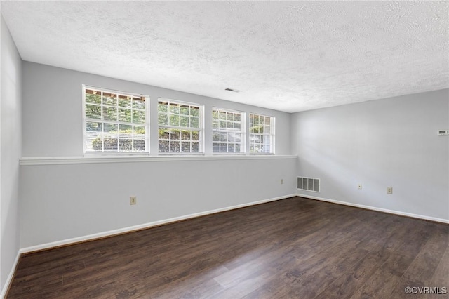7604 Roscommon Ct Unit 2403, Henrico, VA 23228 - spare room with a textured ceiling, wood finished floors, and healthy amount of natural light
