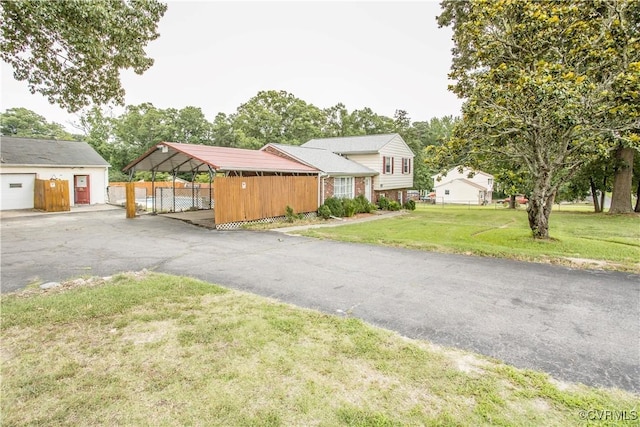 15601 Meridian Ave, Chester, VA 23831 - split level home featuring a carport, brick siding, and driveway