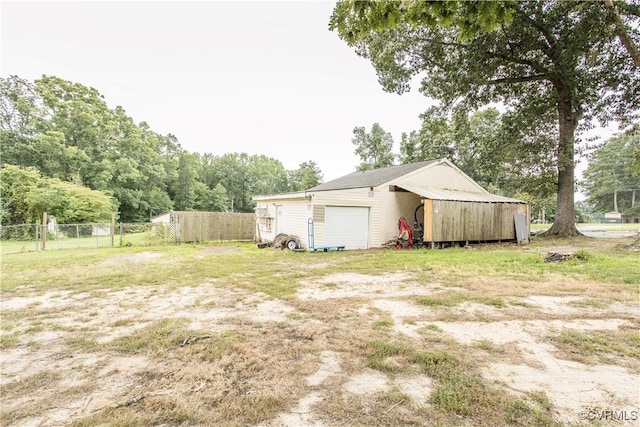 15601 Meridian Ave, Chester, VA 23831 - view of yard featuring a detached garage, an outdoor structure, and a pole building