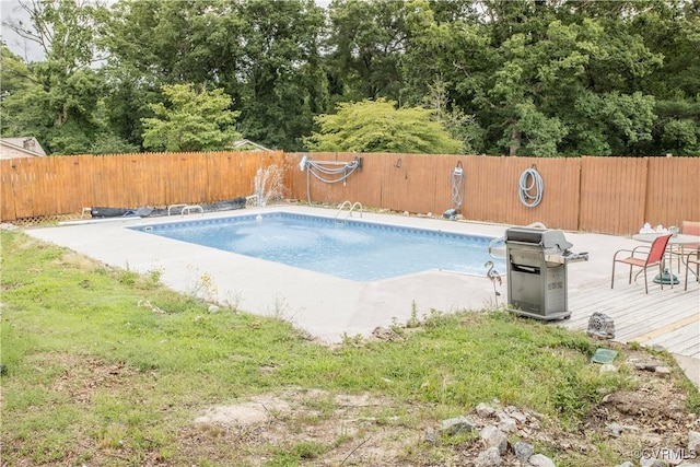 15601 Meridian Ave, Chester, VA 23831 - view of swimming pool with grilling area, a fenced backyard, and a deck