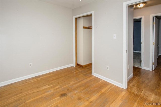 15601 Meridian Ave, Chester, VA 23831 - unfurnished bedroom with light wood finished floors and baseboards