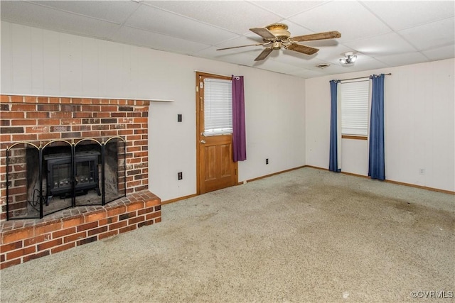 15601 Meridian Ave, Chester, VA 23831 - unfurnished living room with a drop ceiling, ceiling fan, carpet floors, and a fireplace