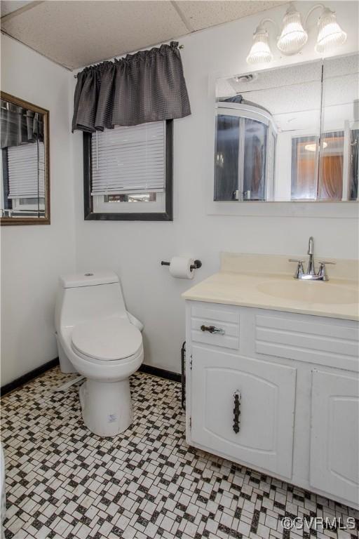 15601 Meridian Ave, Chester, VA 23831 - bathroom with vanity and tile patterned floors