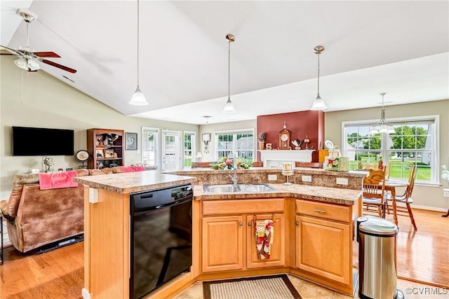 8125 Janice Ave, Mechanicsville, VA 23111 - kitchen featuring black dishwasher, open floor plan, a ceiling fan, light wood finished floors, and high vaulted ceiling