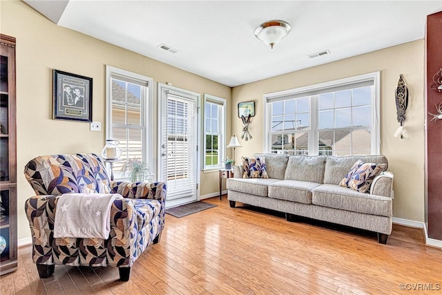 8125 Janice Ave, Mechanicsville, VA 23111 - living area with wood finished floors and plenty of natural light