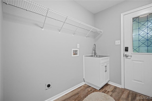 9712 Kingussle Ln, North Chesterfield, VA 23236 - laundry area with washer hookup, dark wood-style floors, hookup for an electric dryer, and cabinet space