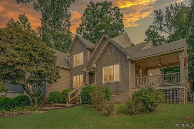 9712 Kingussle Ln, North Chesterfield, VA 23236 - view of front of property with a front lawn, ceiling fan, stairs, and a shingled roof