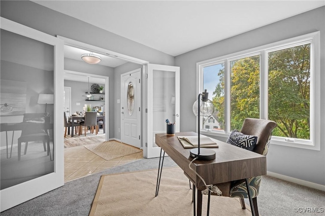 9712 Kingussle Ln, North Chesterfield, VA 23236 - carpeted home office with baseboards and tile patterned flooring