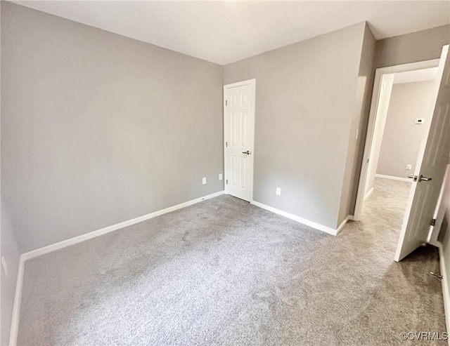 9712 Kingussle Ln, North Chesterfield, VA 23236 - unfurnished bedroom with carpet and baseboards