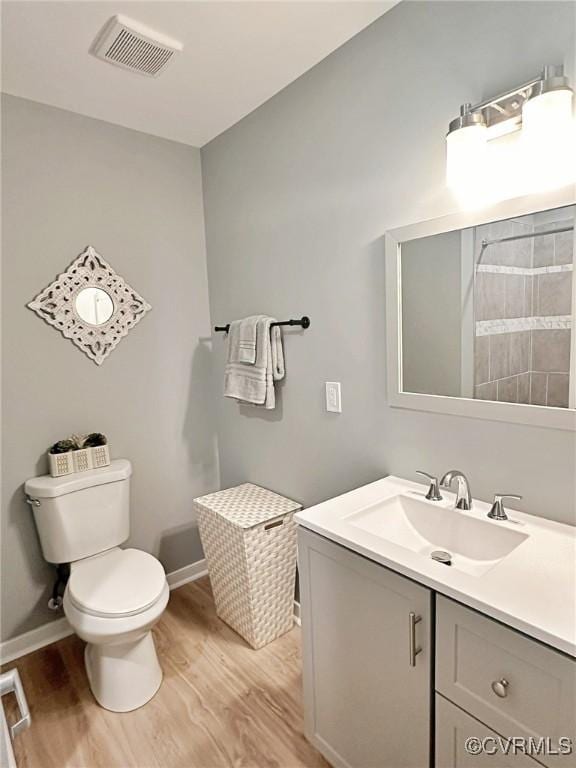9712 Kingussle Ln, North Chesterfield, VA 23236 - bathroom featuring wood finished floors and vanity