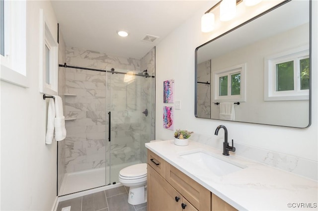 3211 Fox Chase Dr, Midlothian, VA 23112 - full bath with vanity, a marble finish shower, tile patterned flooring, and recessed lighting