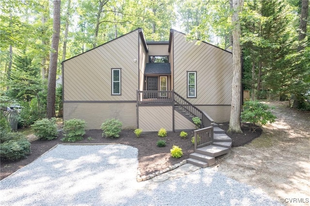 3211 Fox Chase Dr, Midlothian, VA 23112 - mid-century modern home featuring stairway