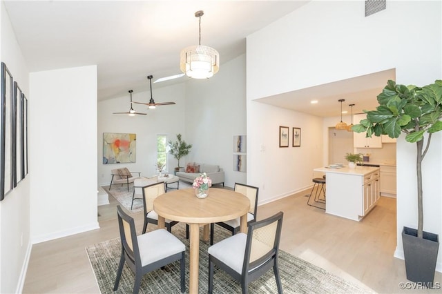 3211 Fox Chase Dr, Midlothian, VA 23112 - dining room featuring light wood-style floors, ceiling fan, and high vaulted ceiling