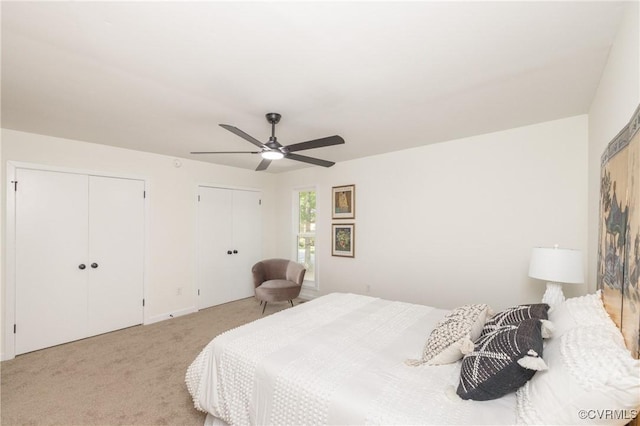 3211 Fox Chase Dr, Midlothian, VA 23112 - bedroom with two closets, light carpet, and a ceiling fan