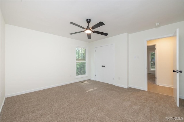 3211 Fox Chase Dr, Midlothian, VA 23112 - unfurnished bedroom featuring carpet, a ceiling fan, and a closet