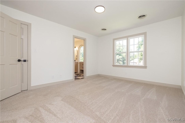 10703 Kriserin Cir, Chester, VA 23831 - unfurnished bedroom featuring multiple windows, carpet flooring, and ensuite bathroom